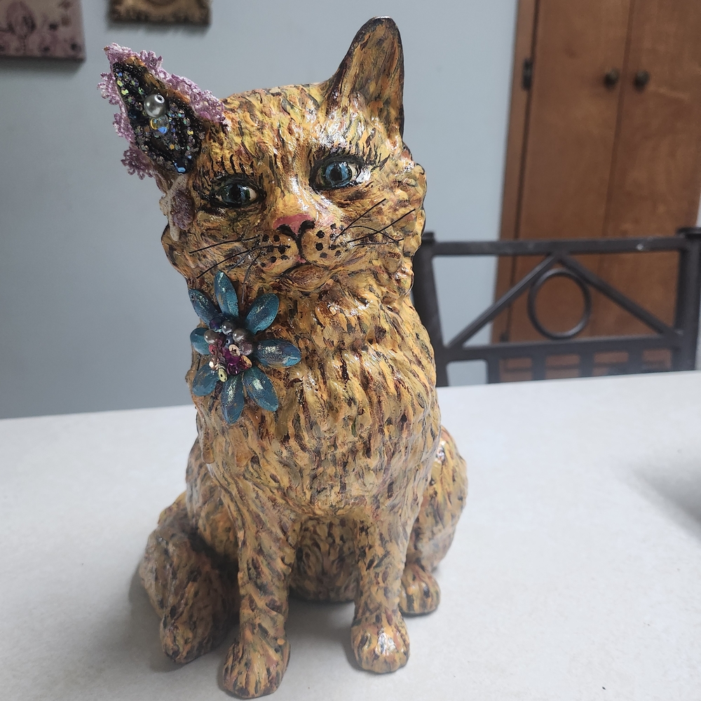 Decorative Cat Figurine with Blue and Purple Accents